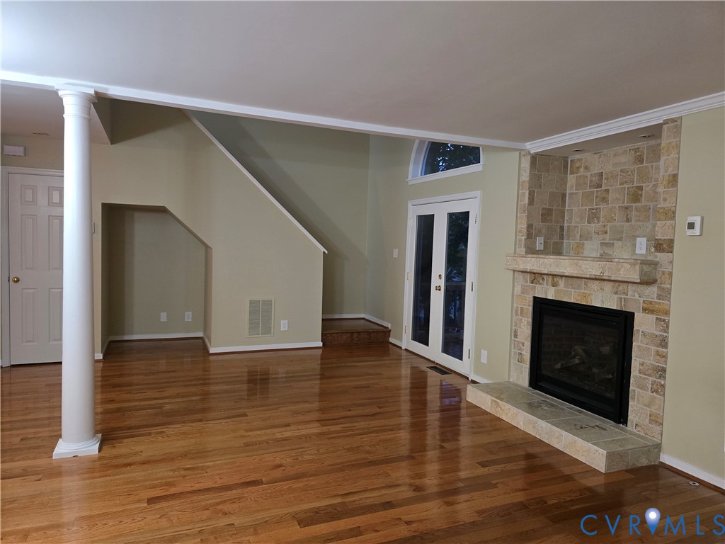 14300 Michaux View Way Midlothian, VA 23113 - Photo 6 of 29 a view of empty room with wooden floor and fireplace