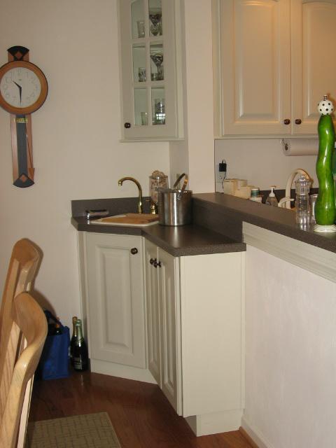835 Gangplank Road, Unit 117 Moneta, VA 24121 - Photo 7 of 11 a kitchen with stainless steel appliances a sink a refrigerator and cabinets