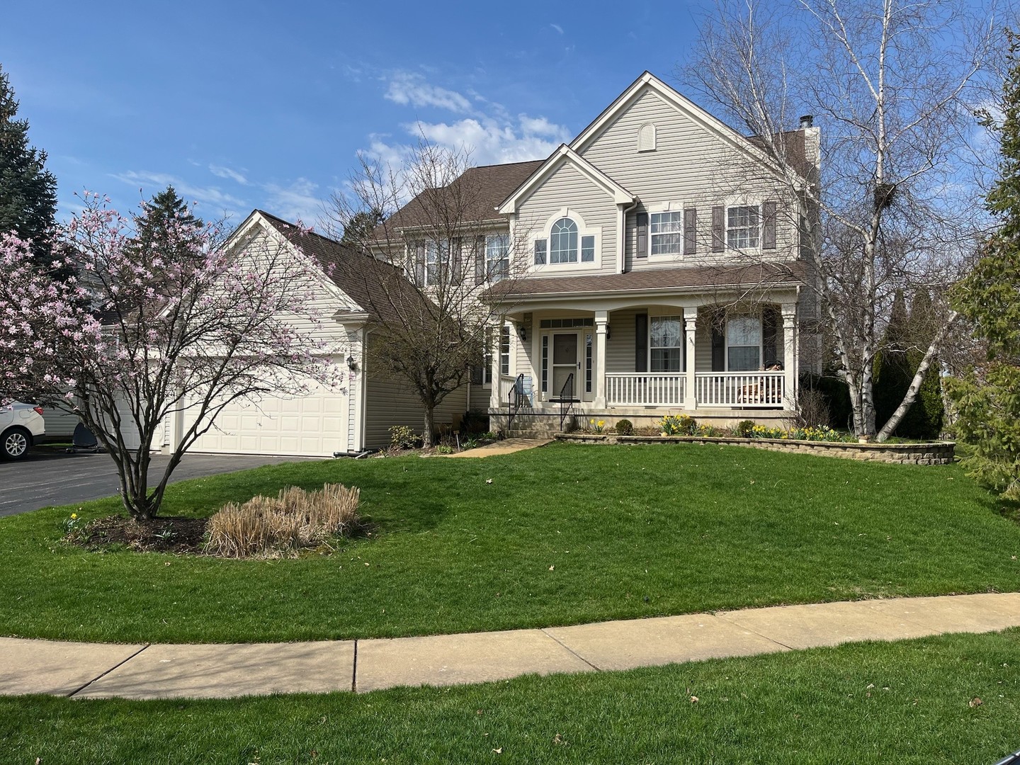 726 Brighton Circle Port Barrington, IL 60010 - Photo 1 of 50 a front view of a house with a yard
