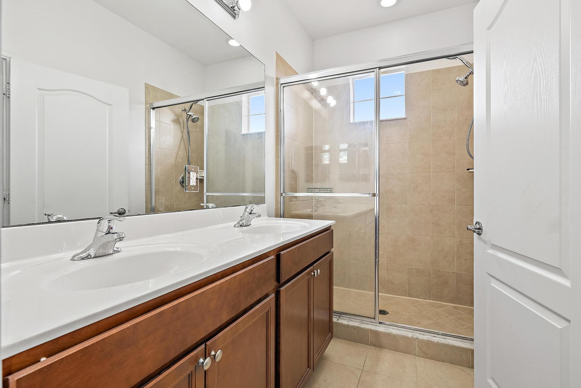 9677 Southwest Purple Martin Way Stuart, FL 34997 - Photo 15 of 30 Primary/Master Bathroom