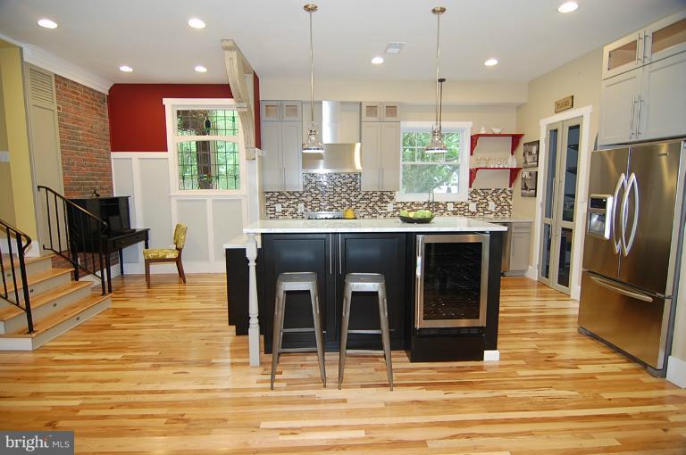 9131 Bradford Road Silver Spring, MD 20901 - Photo 24 of 30 Gourmet center island, with a wine refrigerator