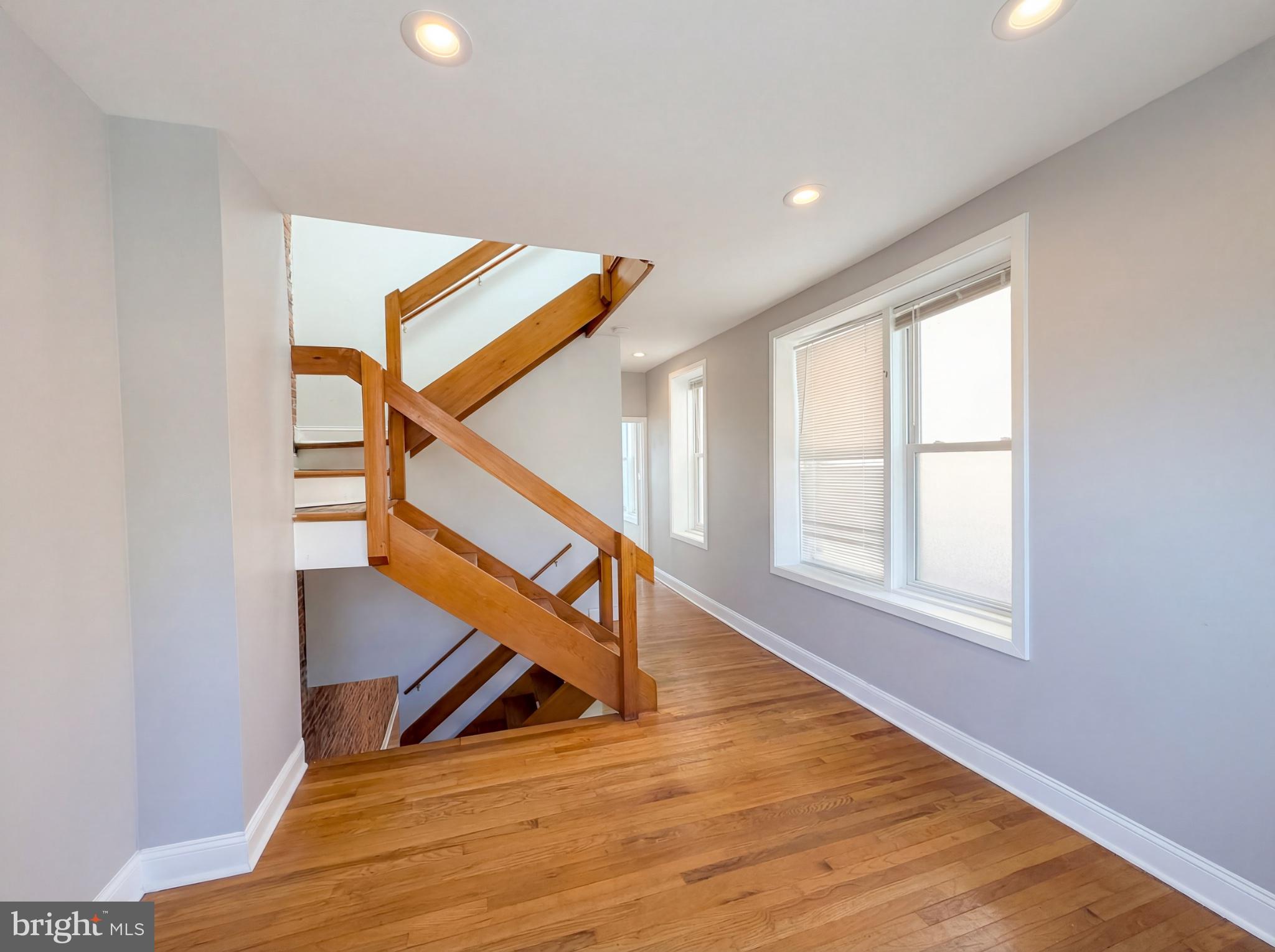 724 13th Street Northeast Washington, DC 20002 - Photo 10 of 20 Bright and airy staircase hallway.