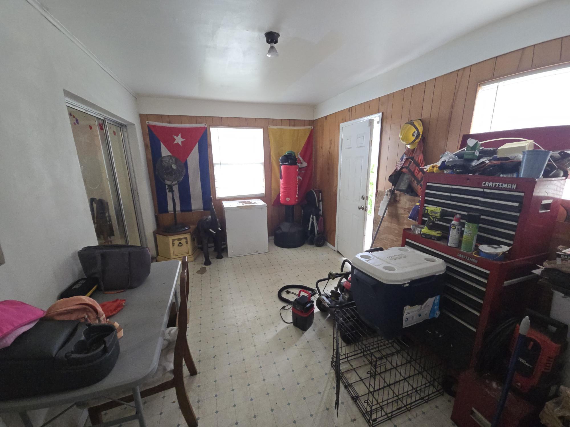 1346 23rd Avenue Southwest Vero Beach, FL 32962 - Photo 24 of 31 a living room with furniture and a window