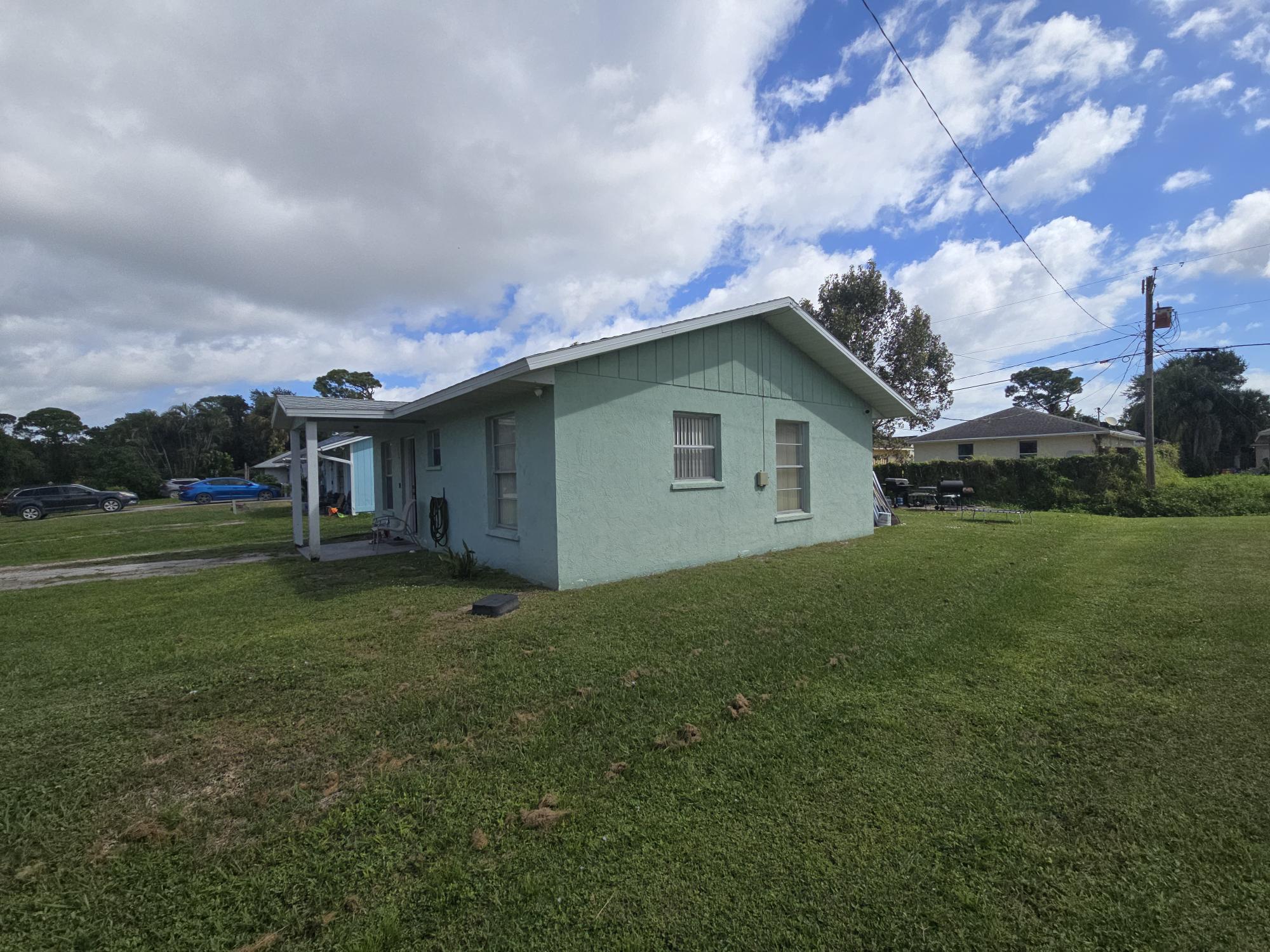 1346 23rd Avenue Southwest Vero Beach, FL 32962 - Photo 29 of 31 a view of a house with backyard