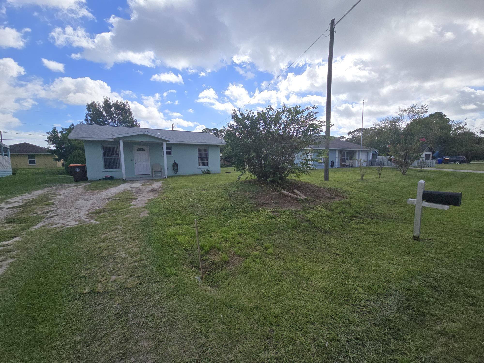1346 23rd Avenue Southwest Vero Beach, FL 32962 - Photo 31 of 31 a view of a house with a backyard