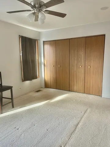 a view of a bathroom with a sink and a window