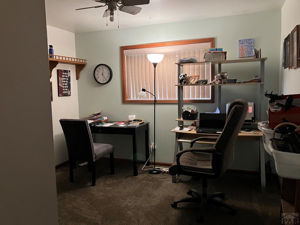 915 Maple Avenue La Junta, CO 81050 - Photo 14 of 34 a view of a workspace with furniture