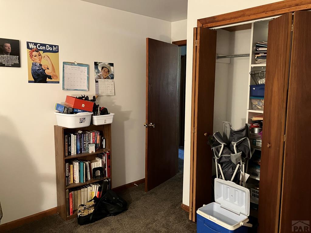 915 Maple Avenue La Junta, CO 81050 - Photo 15 of 34 a room with storage and utility