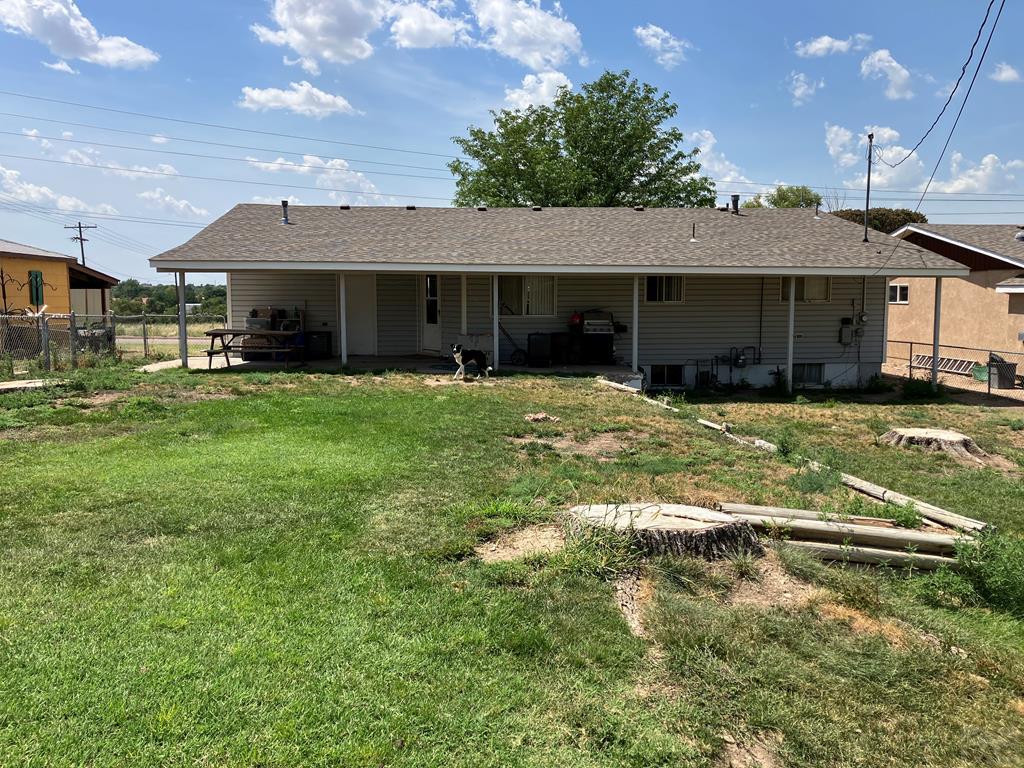 915 Maple Avenue La Junta, CO 81050 - Photo 20 of 34 a house view with a sitting space and garden