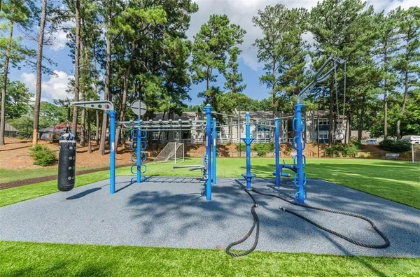 a view of a park with a slide