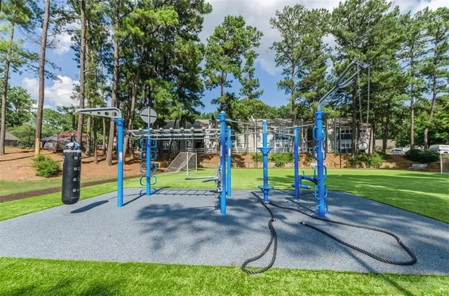 a view of a park with a slide