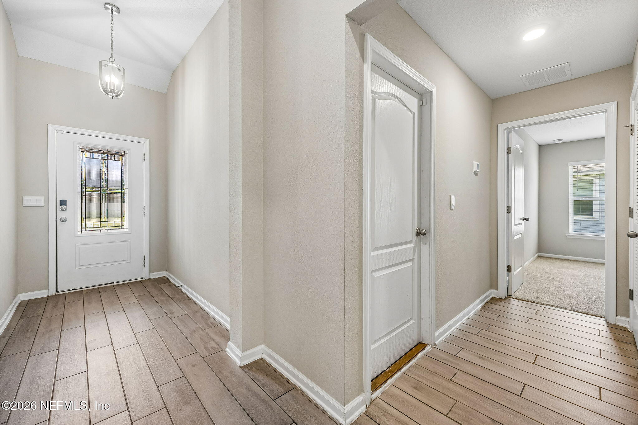 65908 Edgewater Drive Yulee, FL 32097 - Photo 28 of 49 Entry Reverse Right