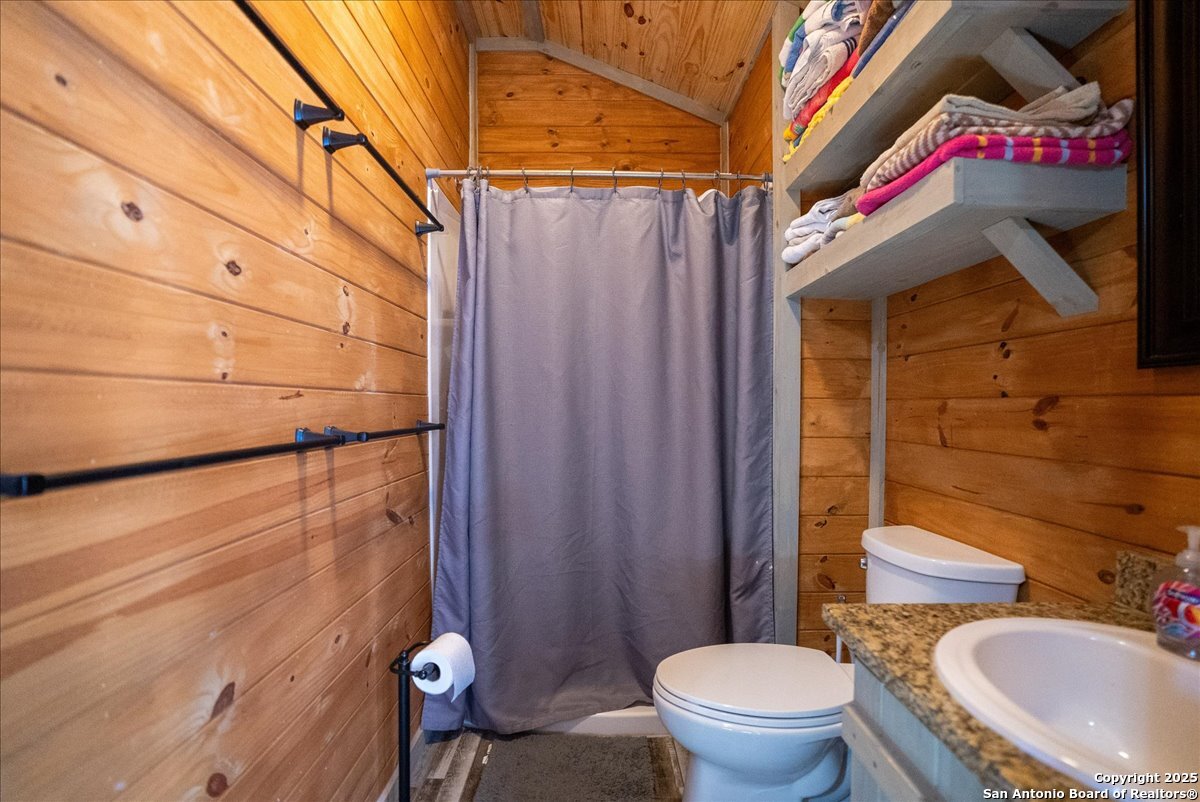 129-131 Ling Road Rockport, TX 78382 - Photo 16 of 38 a bathroom with a toilet and a sink