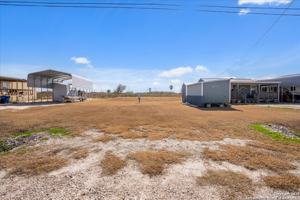 129-131 Ling Road Rockport, TX 78382 - Photo 4 of 38 a view of a lake with houses