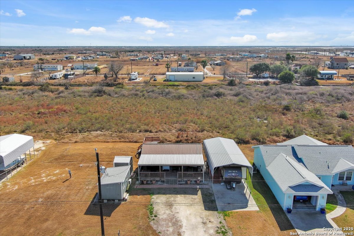 129-131 Ling Road Rockport, TX 78382 - Photo 6 of 38 a view of a terrace with chairs