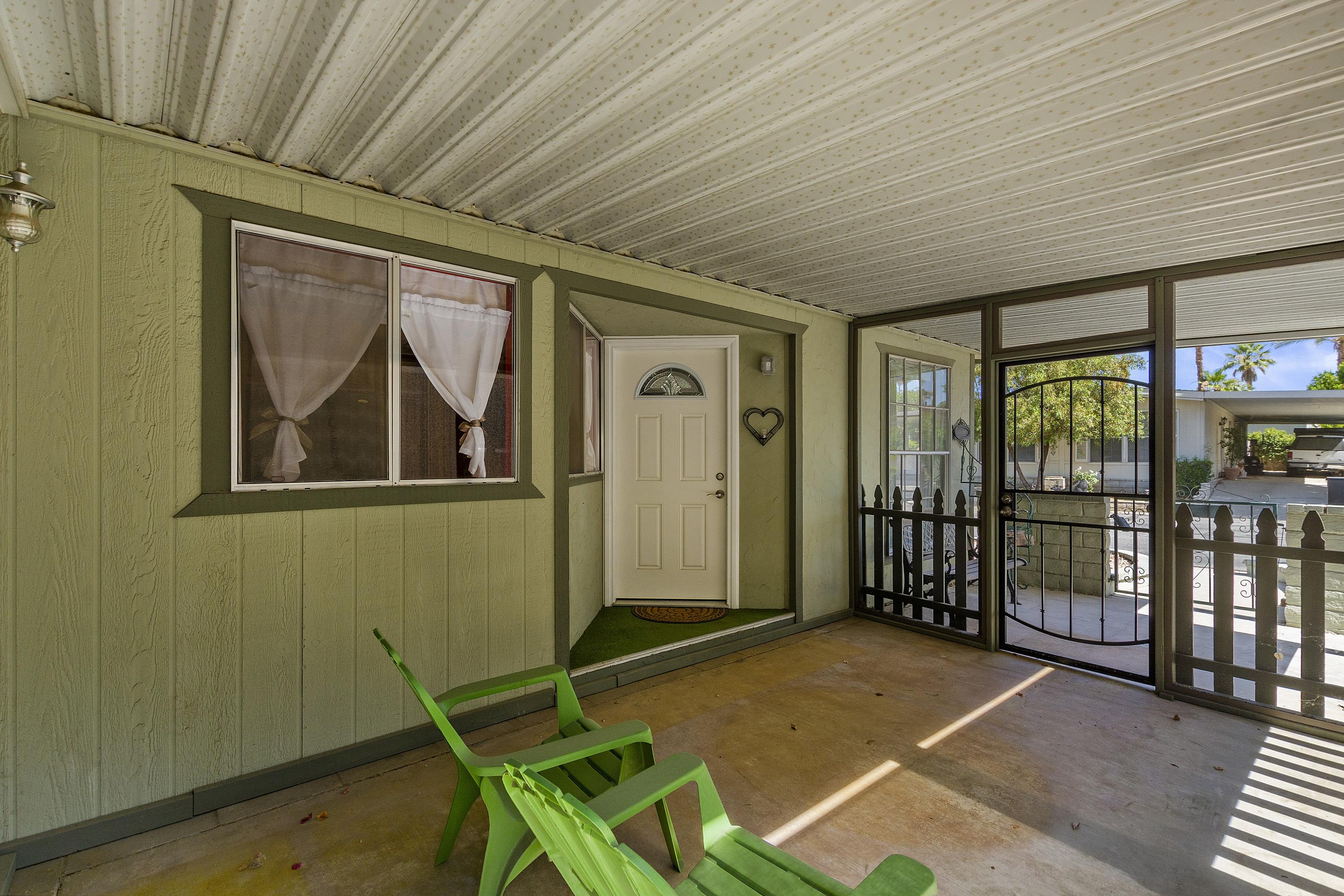 151 Capri Street Rancho Mirage, CA 92270 - Photo 3 of 32 Front Screened-In Porch
