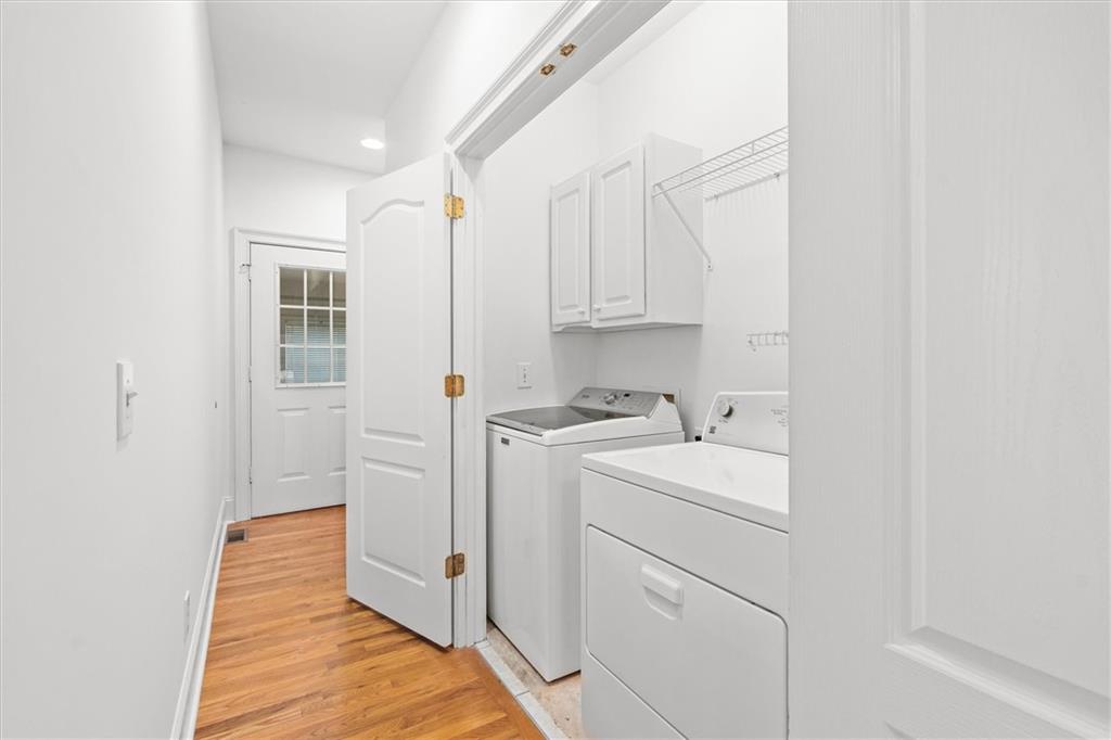 1030 Lakeview Parkway Villa Rica, GA 30180 - Photo 20 of 46 a view of storage and utility room with washer and dryer