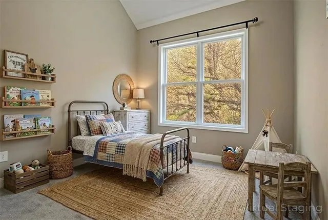 a bedroom with bed and a window