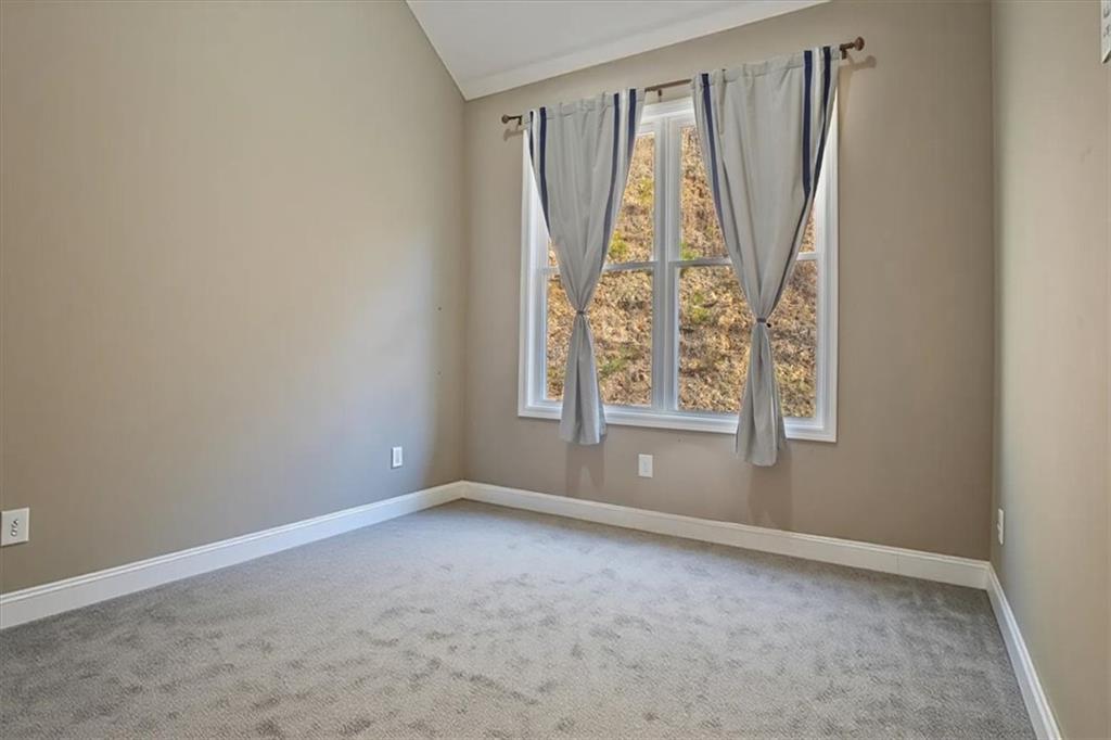 108 Madison Court Jasper, GA 30143 - Photo 16 of 36 an empty room with windows