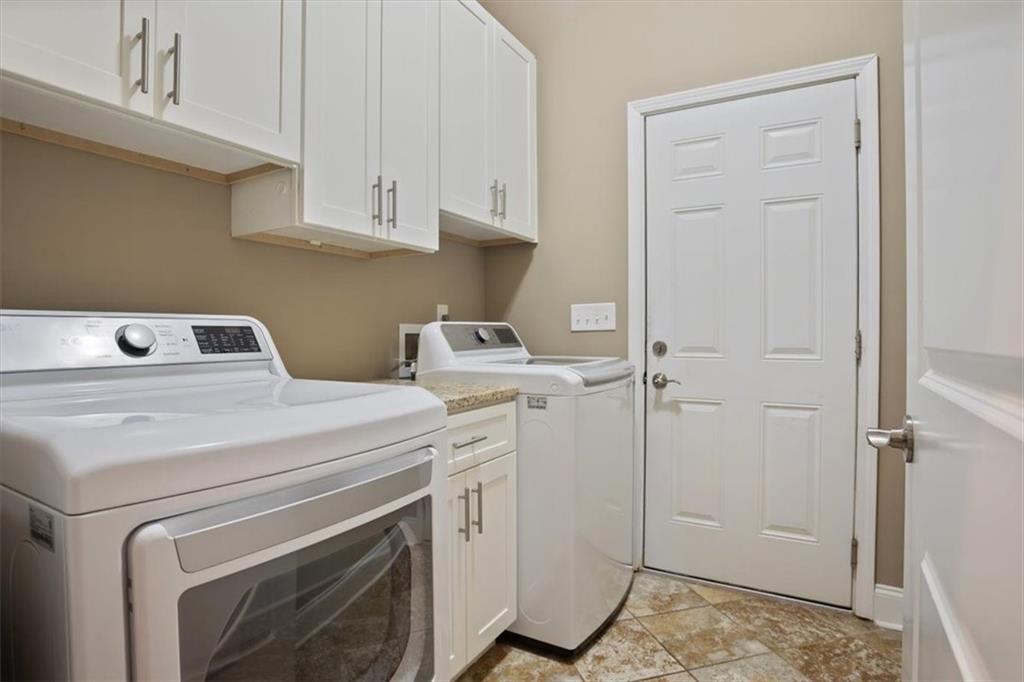 108 Madison Court Jasper, GA 30143 - Photo 21 of 36 a utility room with dryer and washer