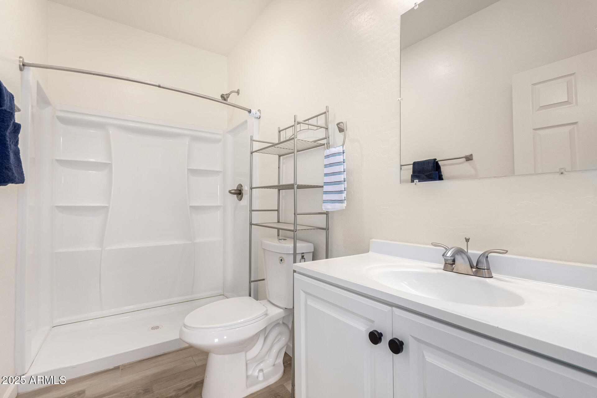 2746 West Pima Street, Unit 2 Phoenix, AZ 85009 - Photo 20 of 25 a bathroom with a sink toilet and shower
