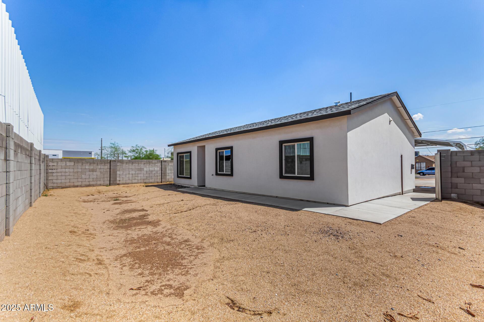 2746 West Pima Street, Unit 2 Phoenix, AZ 85009 - Photo 22 of 24 a view of backyard of house