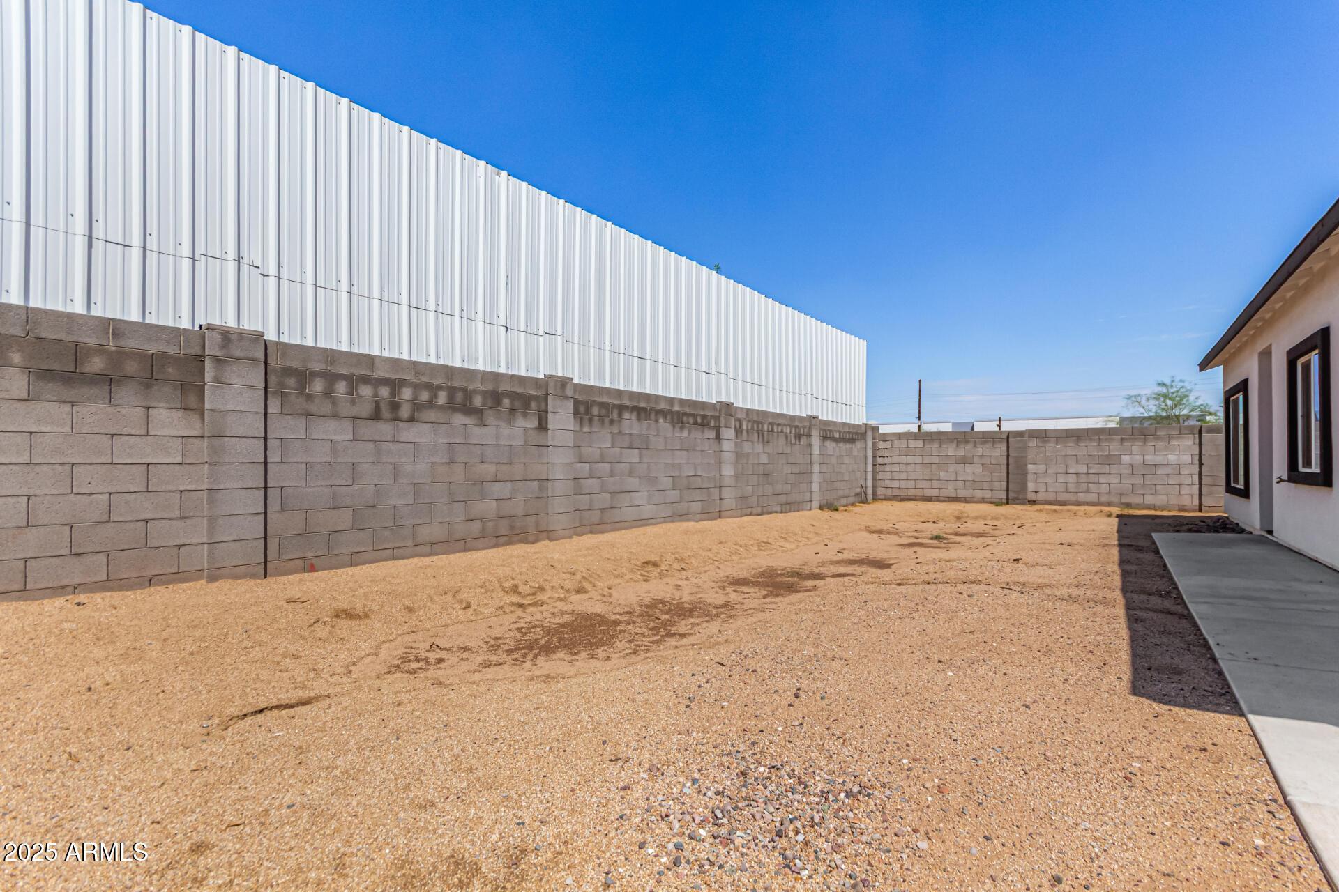 2746 West Pima Street, Unit 2 Phoenix, AZ 85009 - Photo 23 of 24 a view of a backyard of the house