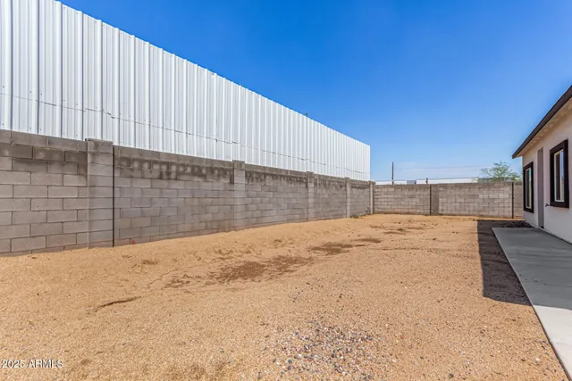 a view of backyard of house