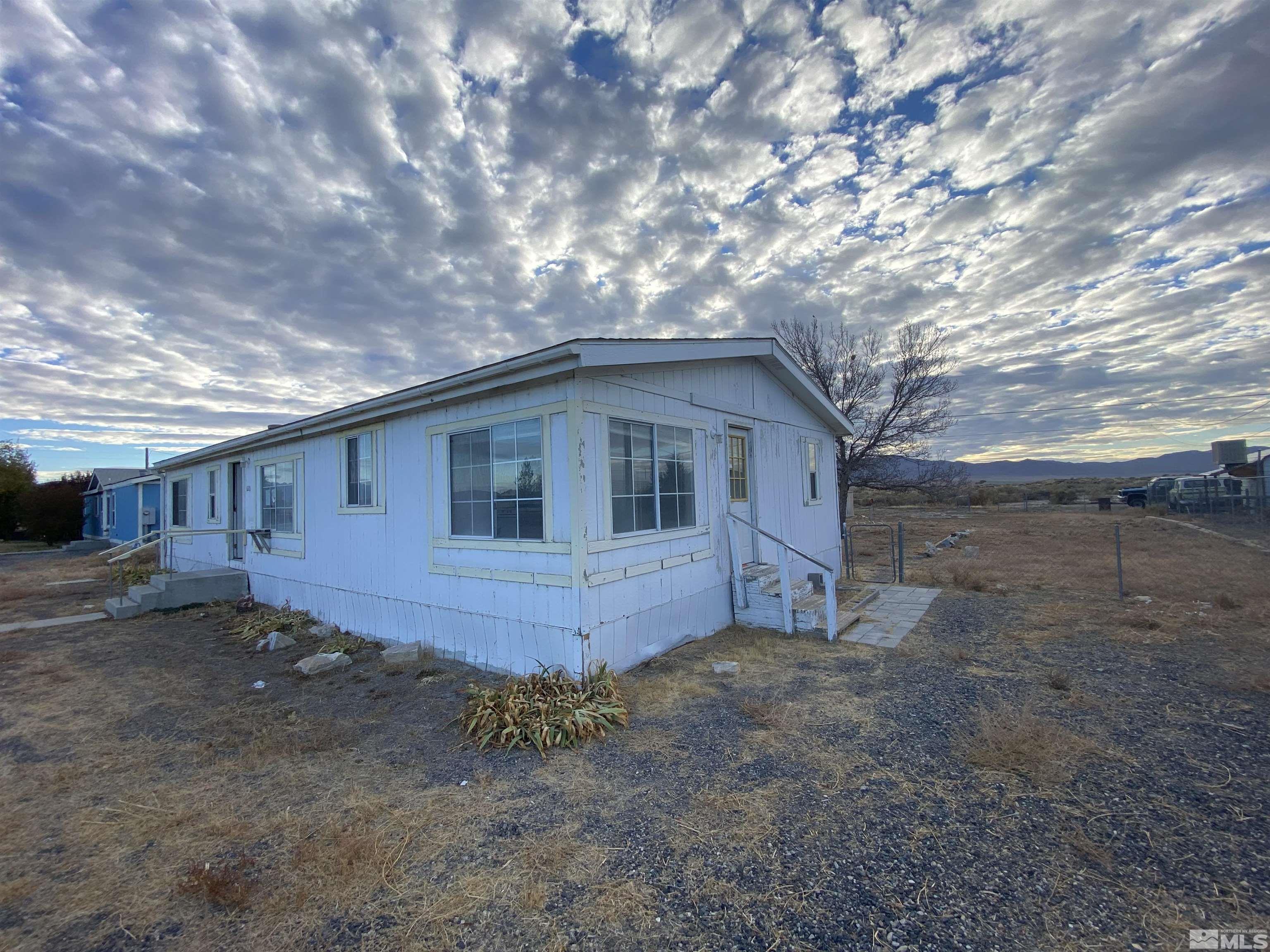 620 Reservoir Road Lovelock, NV 89419 - Photo 3 of 25 a house view with a backyard space