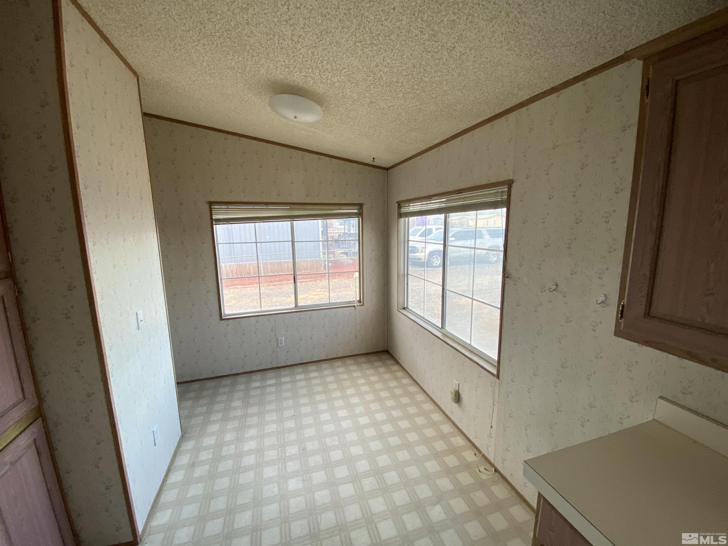 620 Reservoir Road Lovelock, NV 89419 - Photo 7 of 25 a view of an empty room with a window