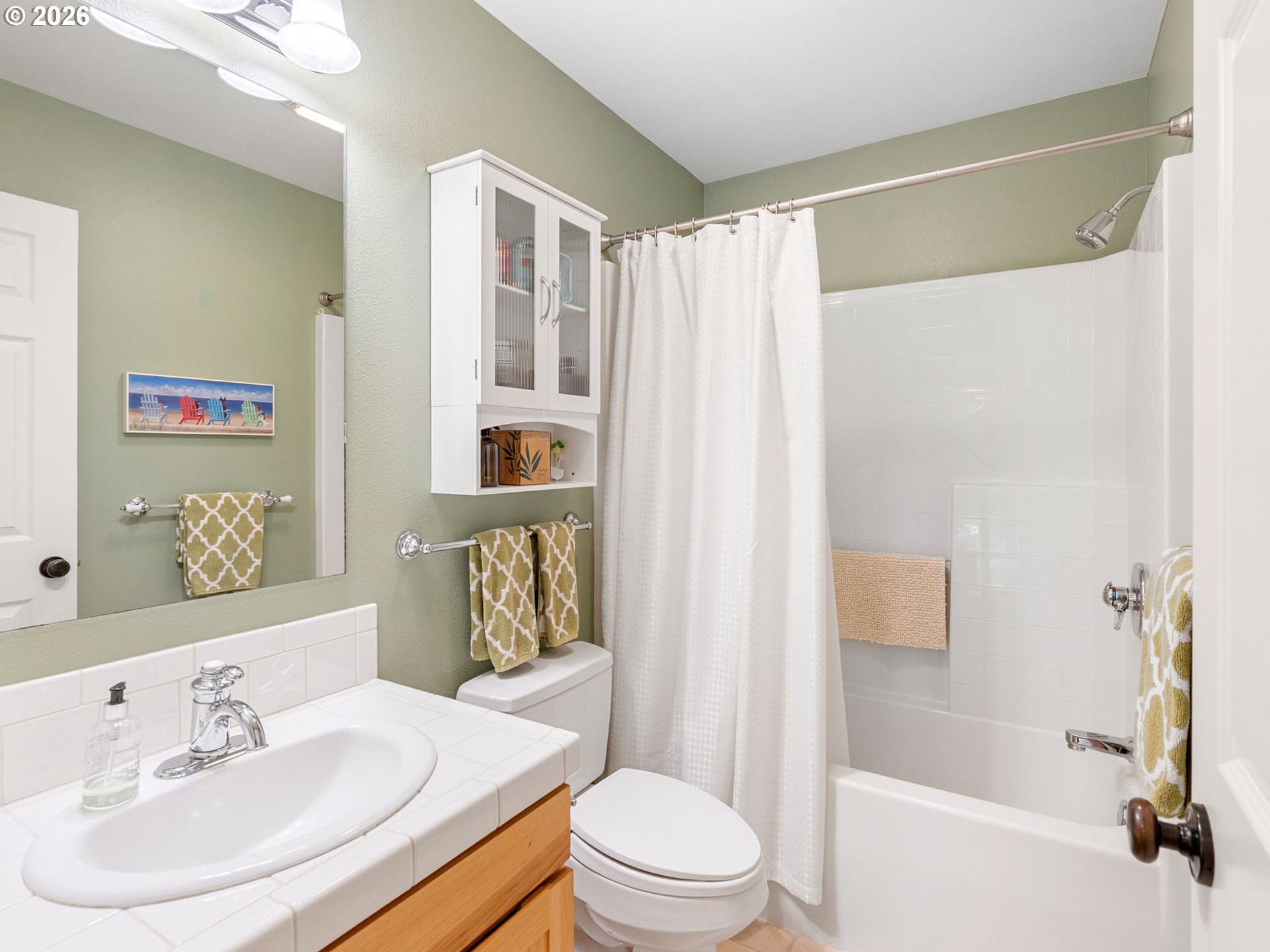 10 Big Tree Road Gleneden Beach, OR 97388 - Photo 16 of 48 a bathroom with a sink toilet and shower