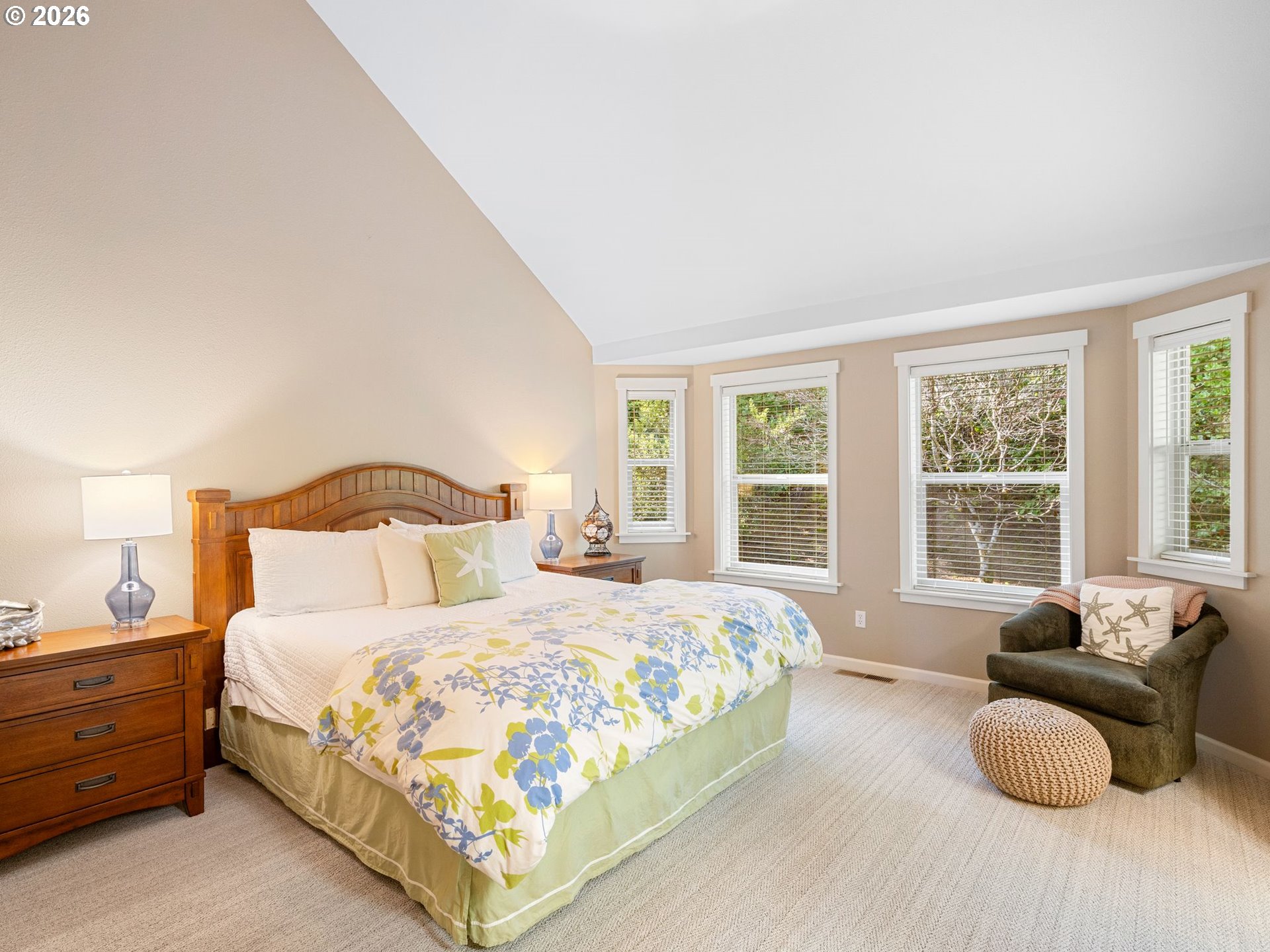 10 Big Tree Road Gleneden Beach, OR 97388 - Photo 19 of 48 a bedroom with a bed and a large window