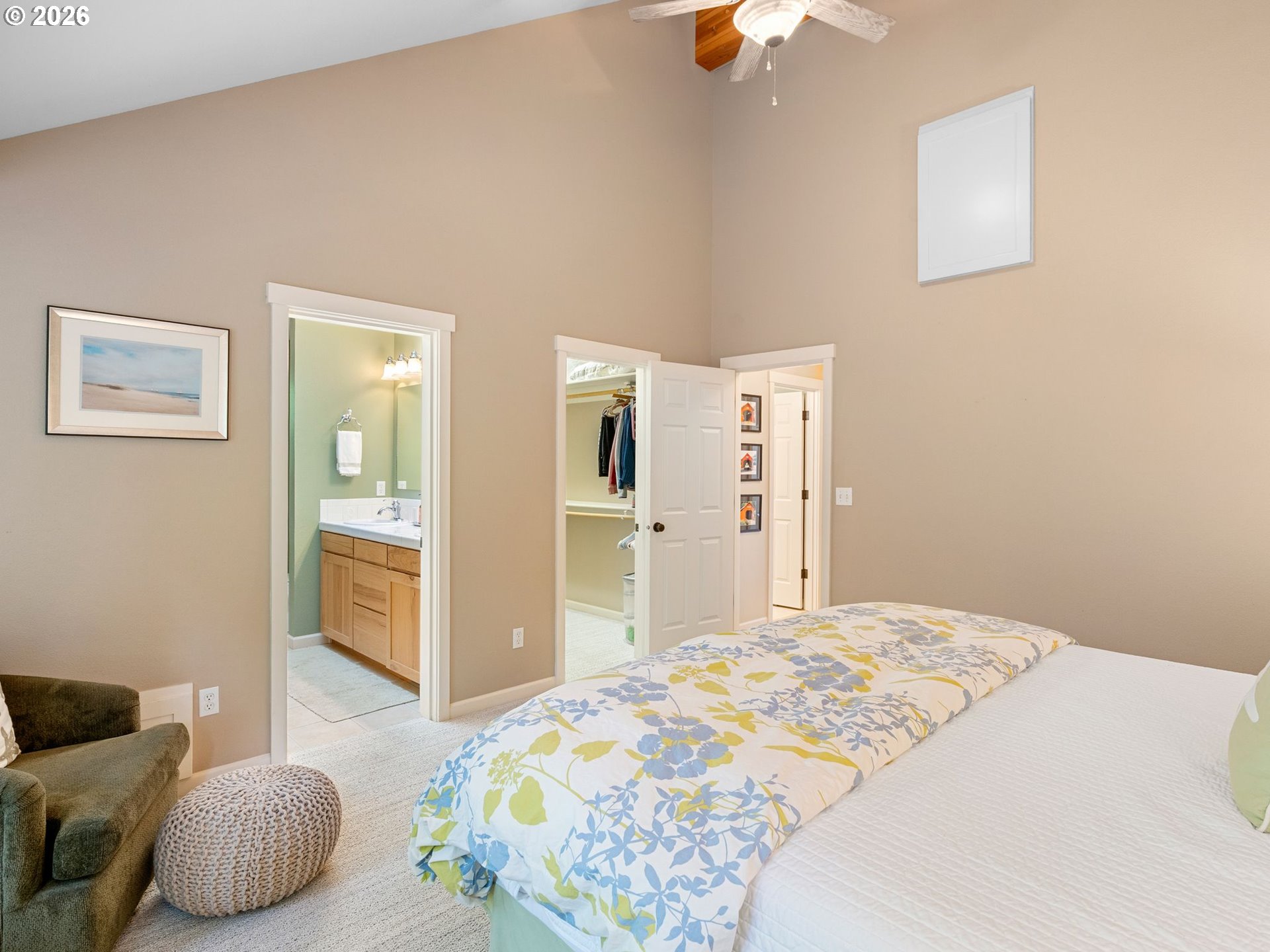 10 Big Tree Road Gleneden Beach, OR 97388 - Photo 21 of 48 a bedroom with a bed and walk in closet