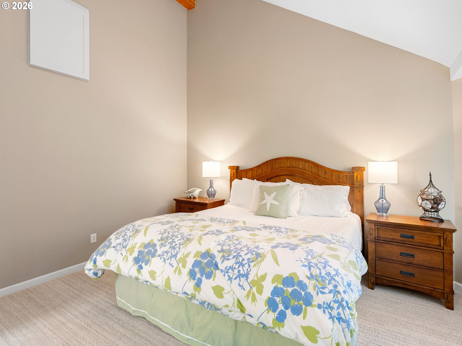 10 Big Tree Road Gleneden Beach, OR 97388 - Photo 22 of 48 a bedroom with a bed and a night stand