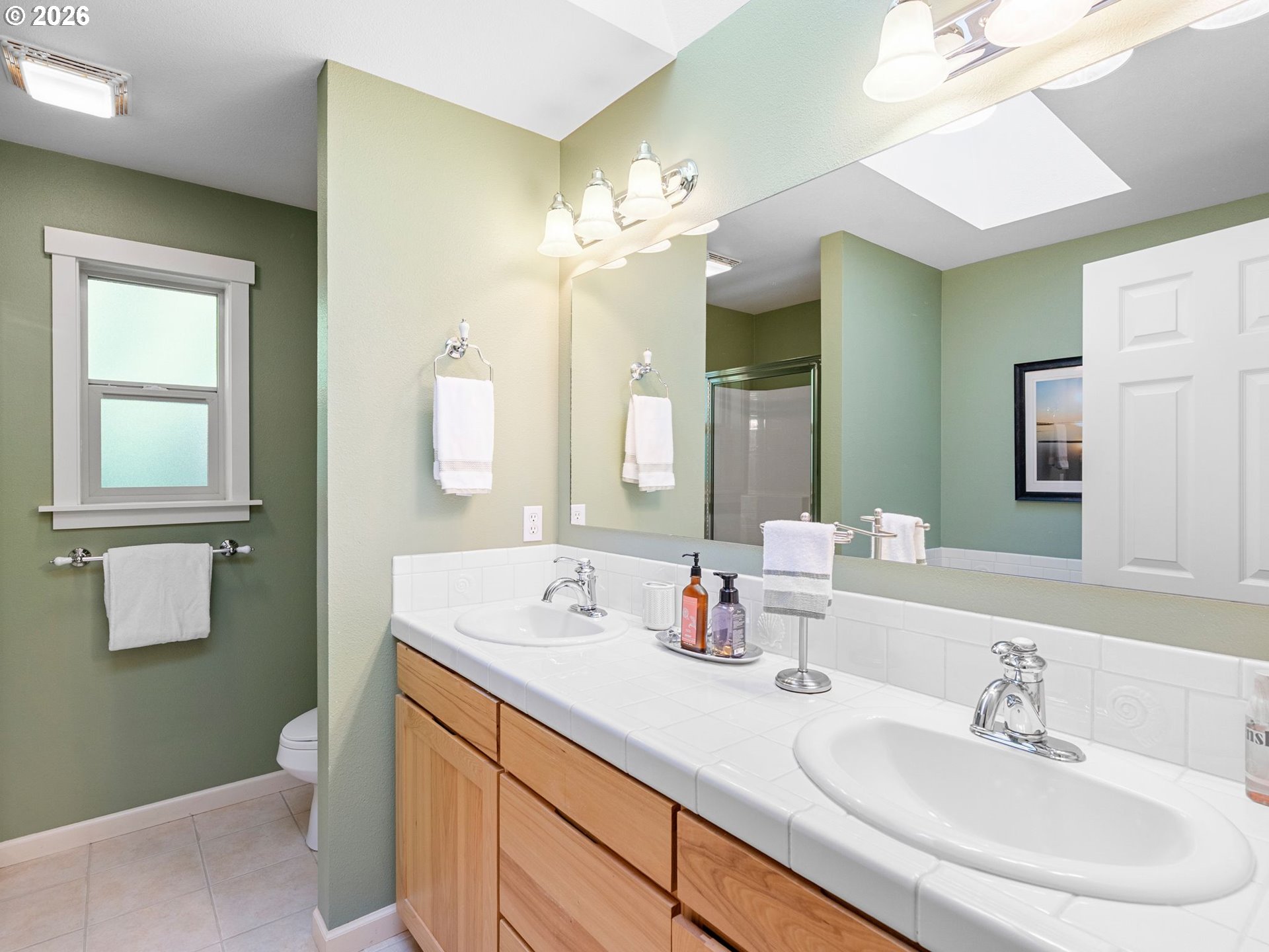 10 Big Tree Road Gleneden Beach, OR 97388 - Photo 23 of 48 a bathroom with a sink double vanity and a mirror