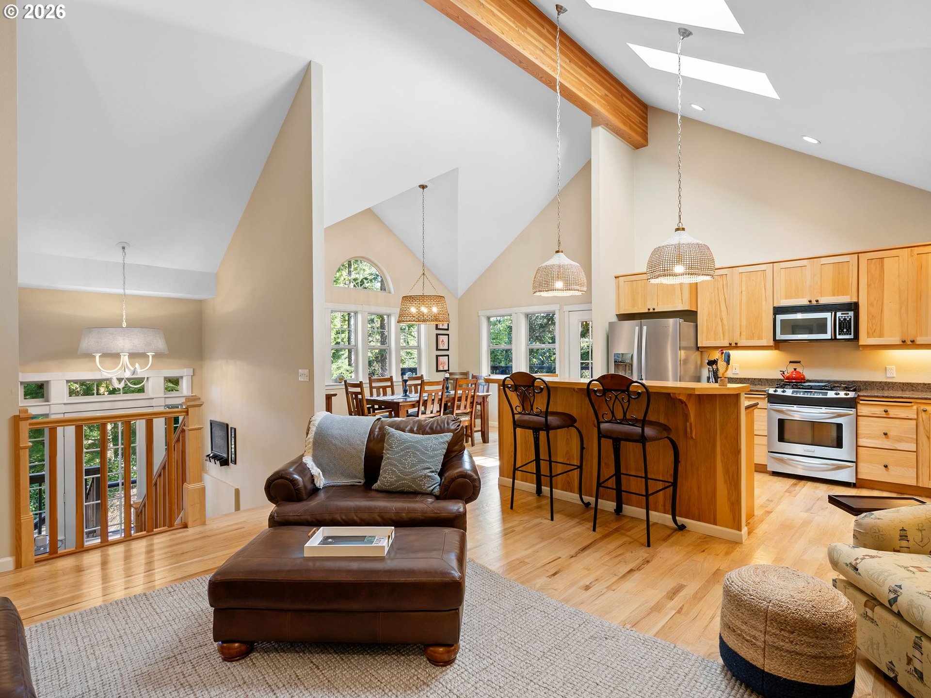 10 Big Tree Road Gleneden Beach, OR 97388 - Photo 3 of 48 a living room with furniture a fireplace and a large window