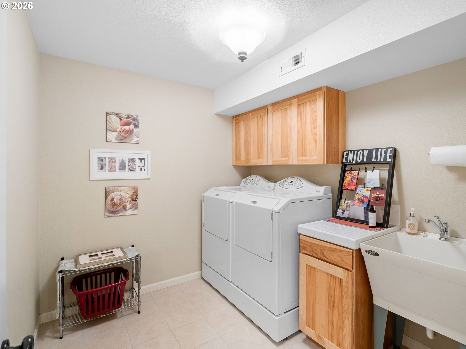 10 Big Tree Road Gleneden Beach, OR 97388 - Photo 31 of 48 a utility room with dryer and washer