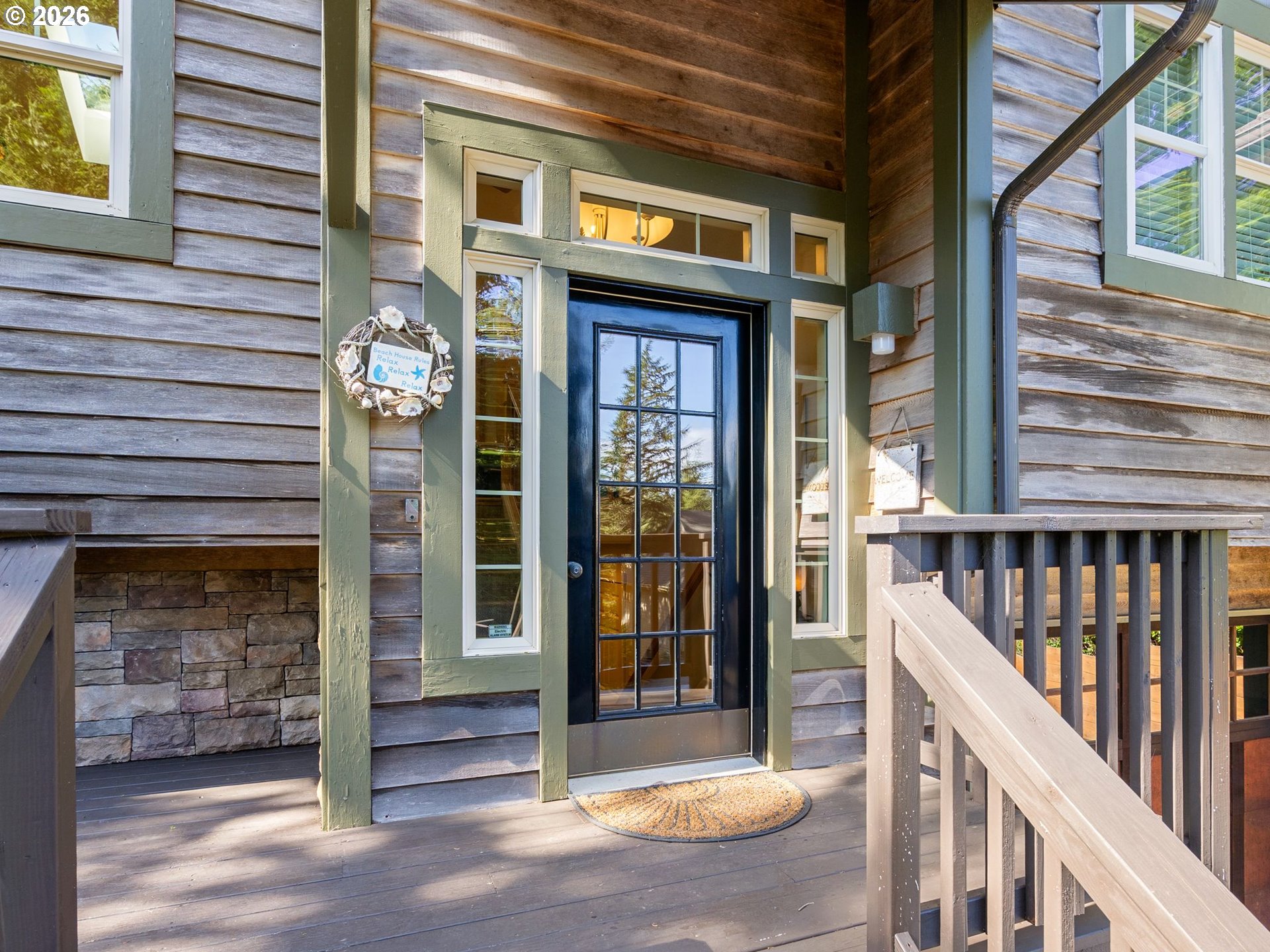 10 Big Tree Road Gleneden Beach, OR 97388 - Photo 35 of 48 a view of a brick building with a large window