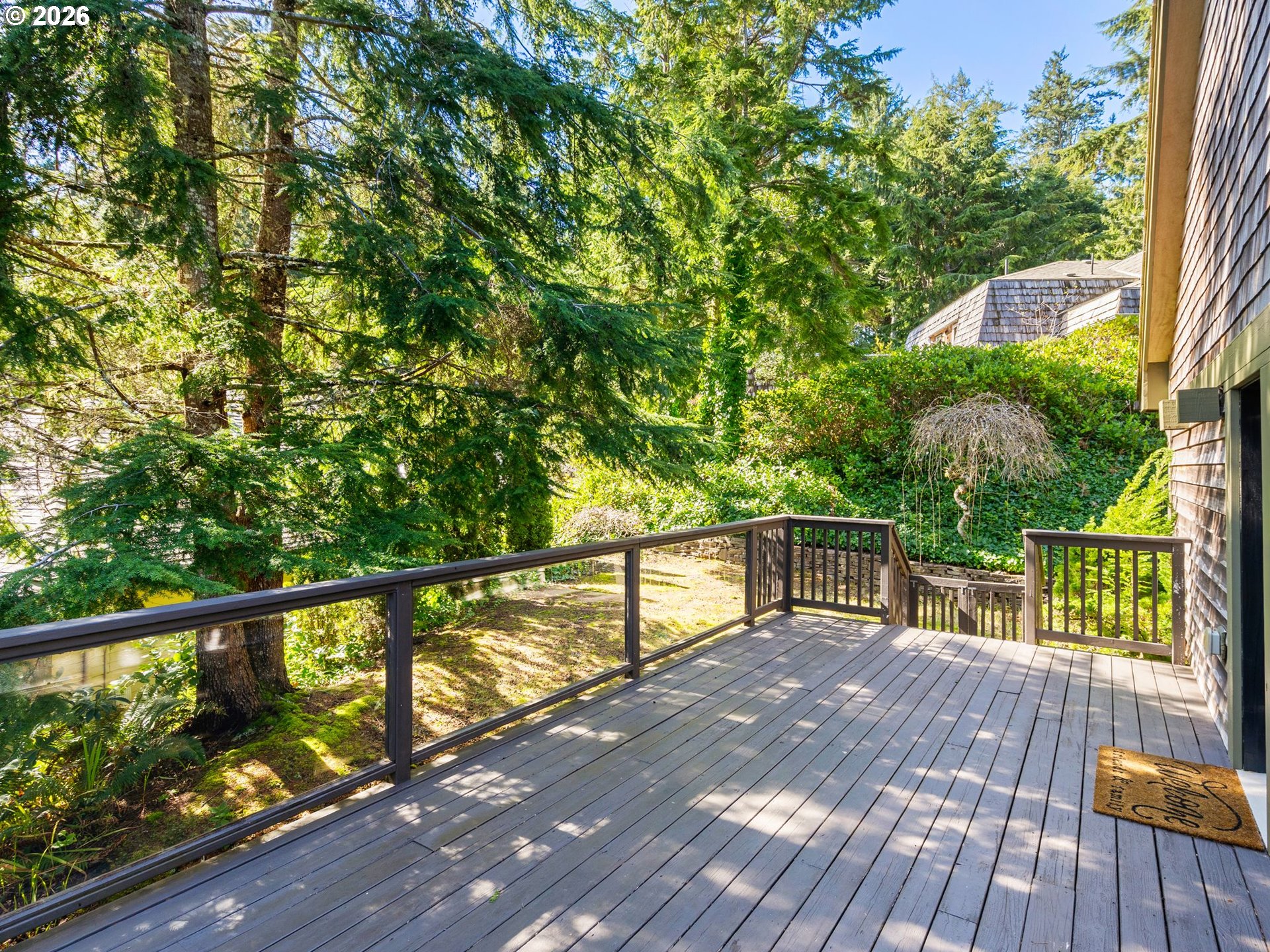 10 Big Tree Road Gleneden Beach, OR 97388 - Photo 36 of 48 a view of a balcony with wooden floor