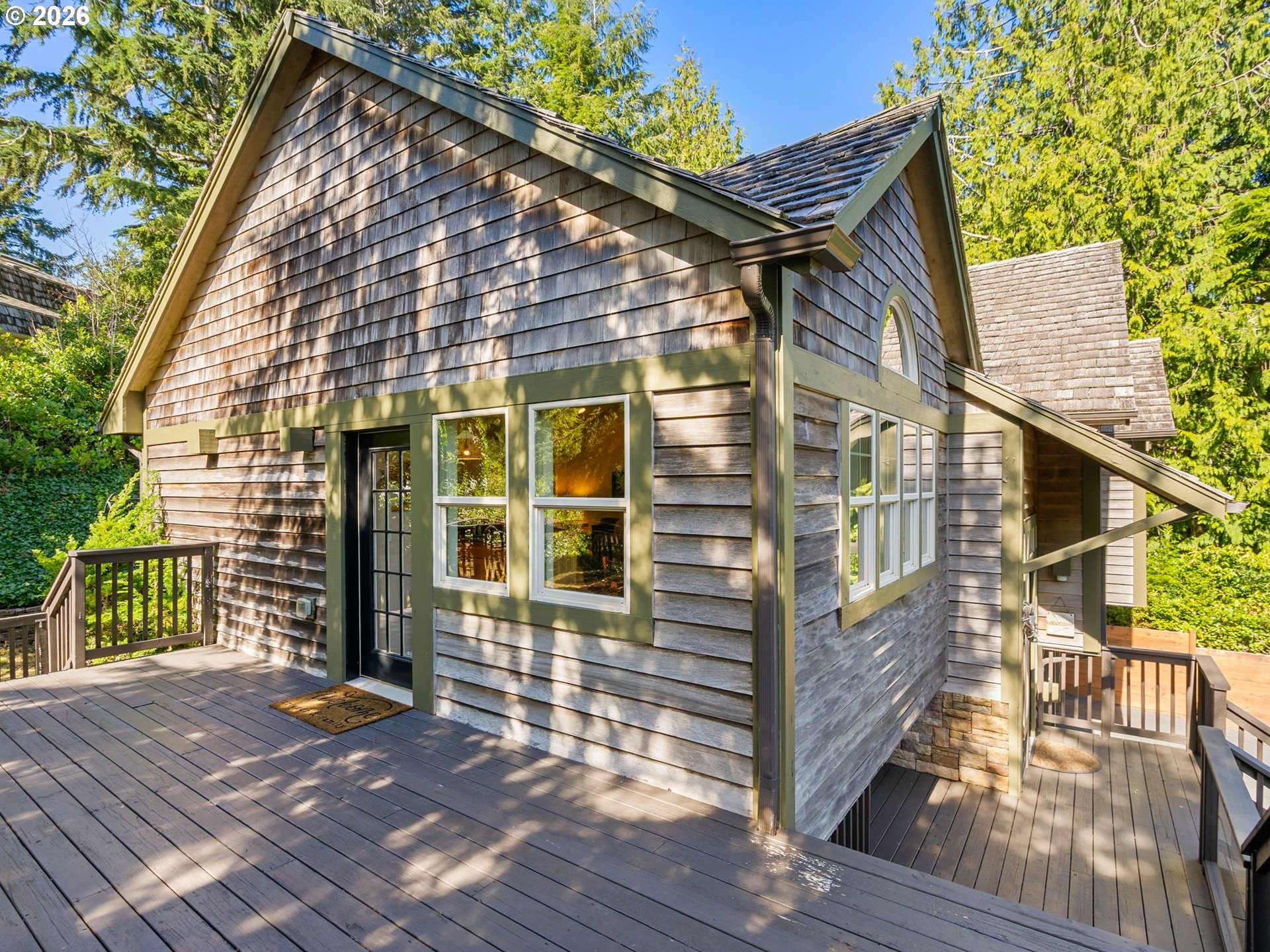 10 Big Tree Road Gleneden Beach, OR 97388 - Photo 37 of 48 front view of a house with a porch