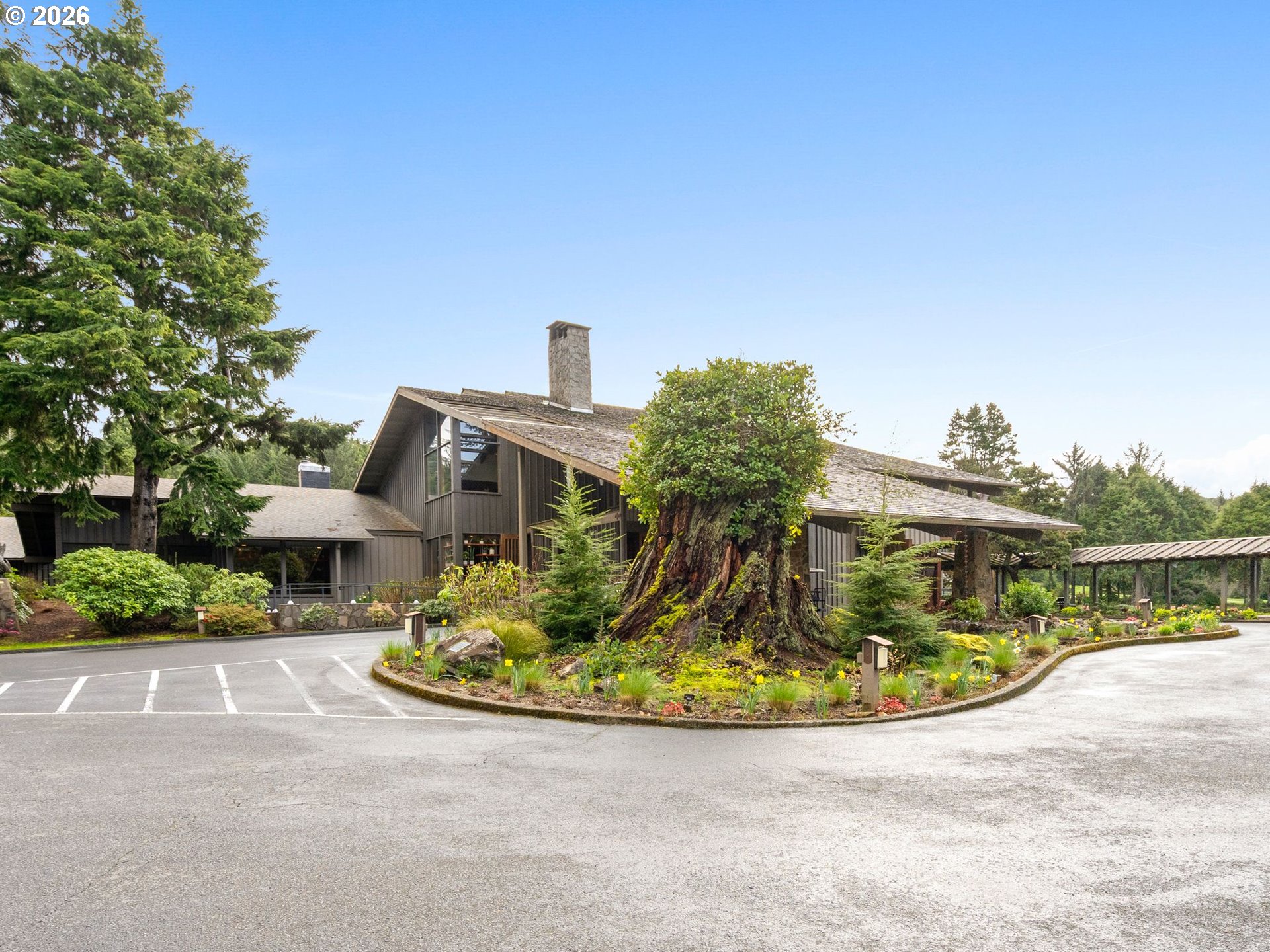 10 Big Tree Road Gleneden Beach, OR 97388 - Photo 46 of 48 a view of a house with a swimming pool