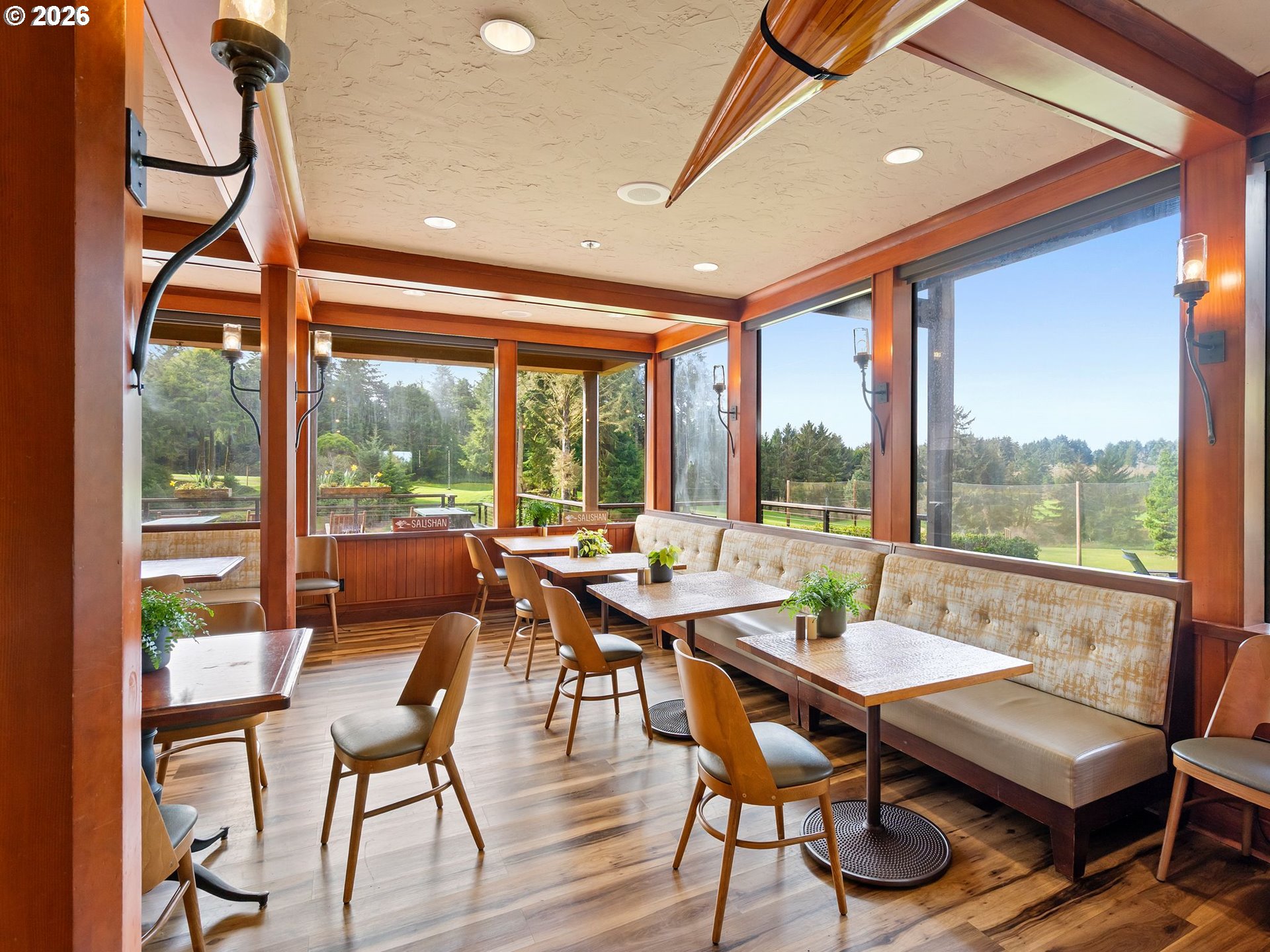 10 Big Tree Road Gleneden Beach, OR 97388 - Photo 48 of 48 a dining room with furniture a chandelier and wooden floor