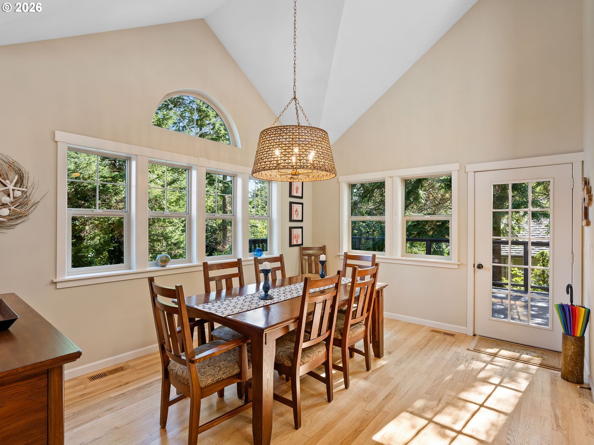 10 Big Tree Road Gleneden Beach, OR 97388 - Photo 6 of 48 a view of a dining room with furniture window and outside view