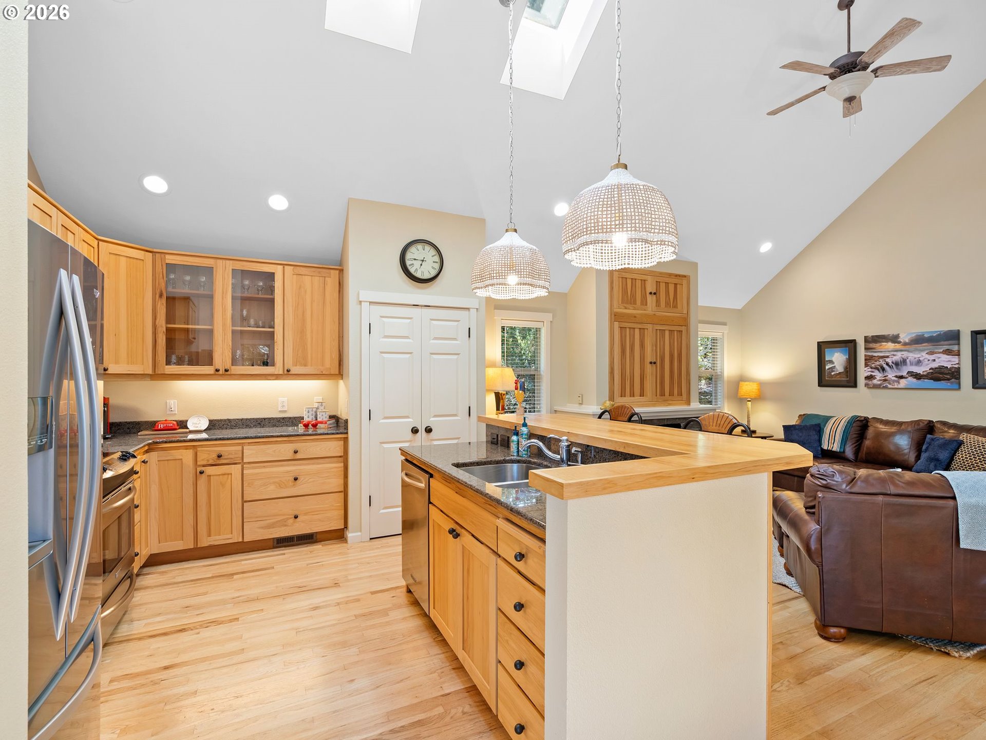 10 Big Tree Road Gleneden Beach, OR 97388 - Photo 10 of 48 a kitchen that has a lot of cabinets in it