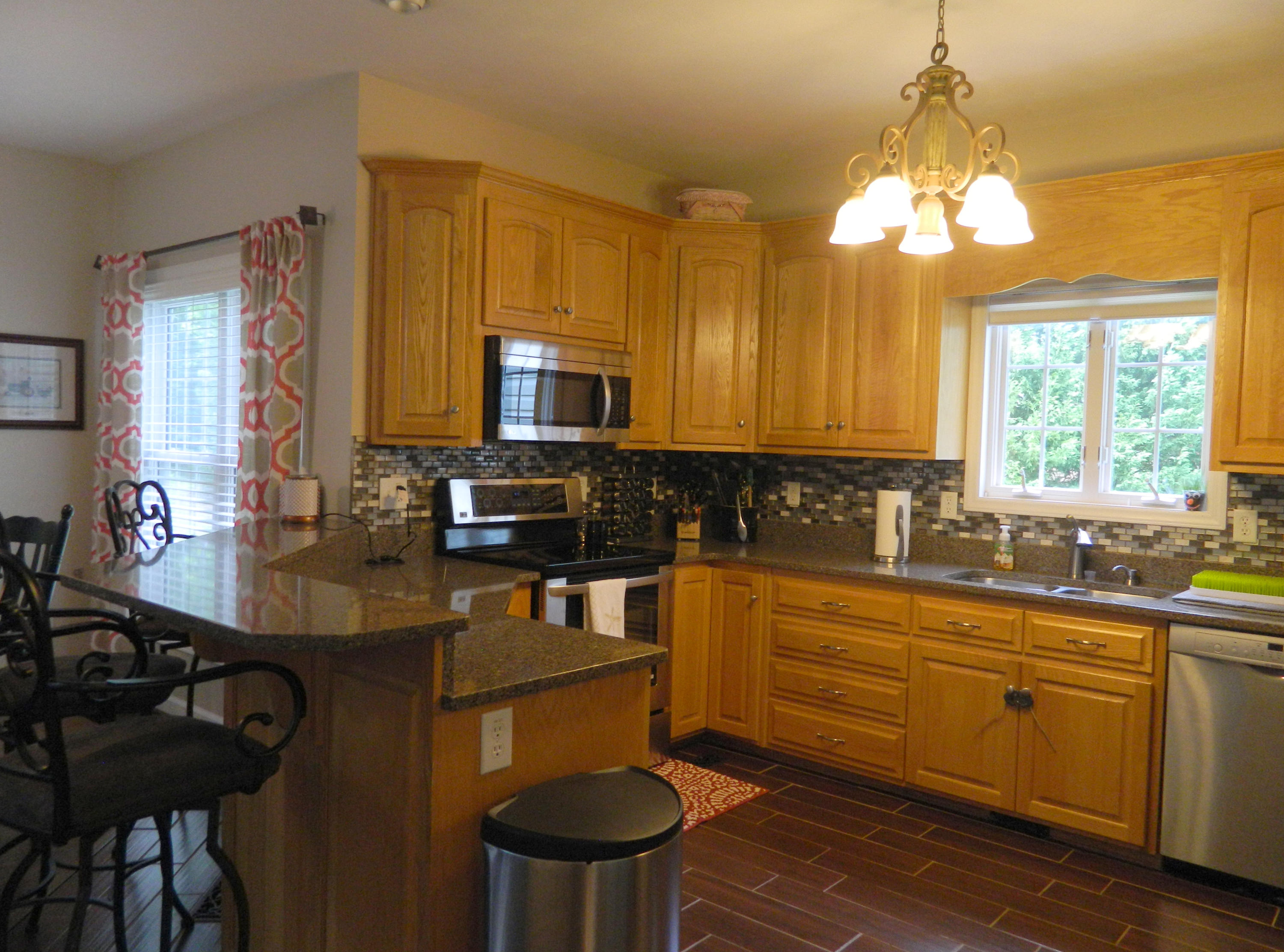 75 Cobblestone Drive Blue Ridge, VA 24064 - Photo 13 of 60 a kitchen with a sink stove and microwave
