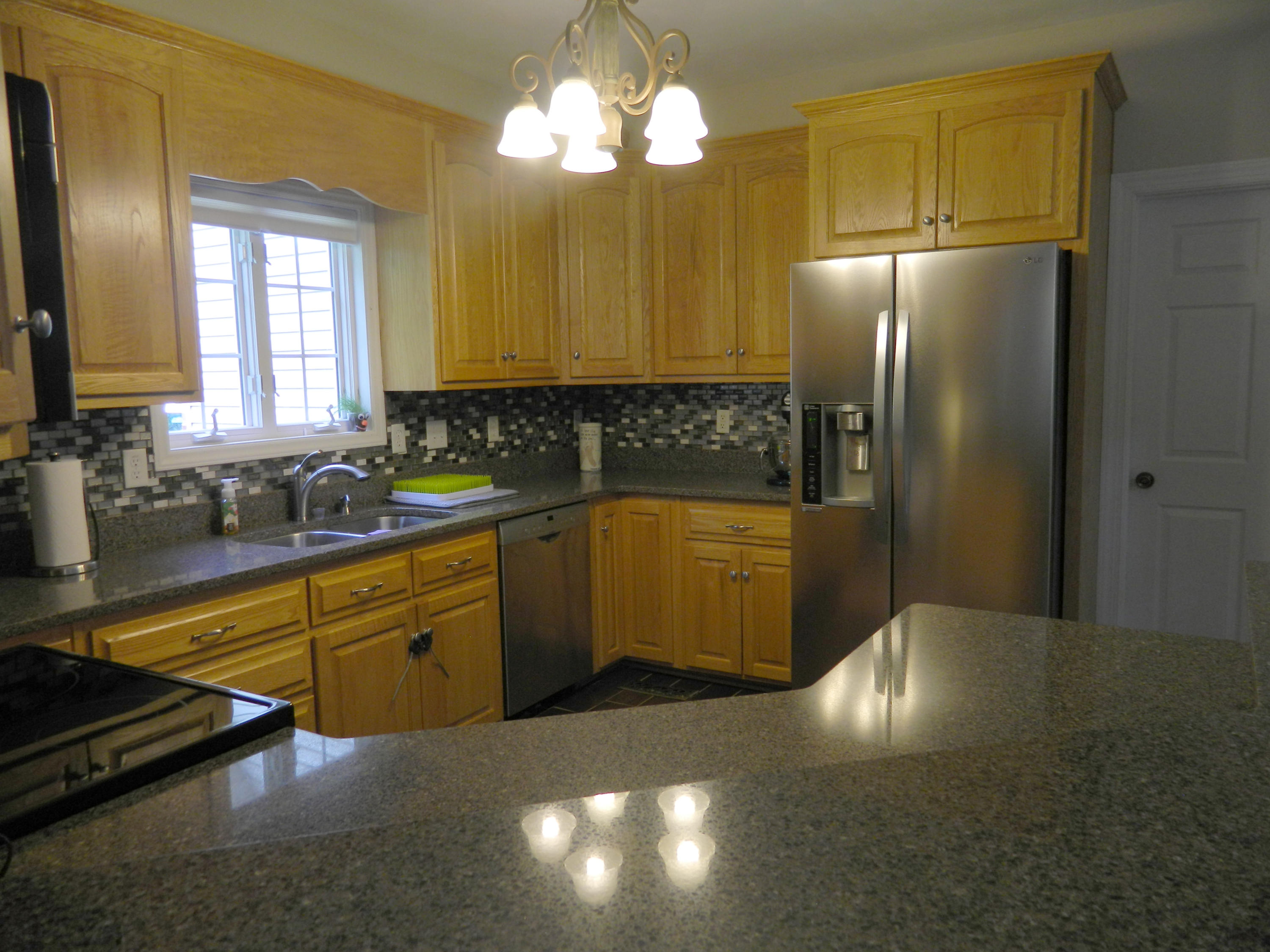 75 Cobblestone Drive Blue Ridge, VA 24064 - Photo 15 of 60 a kitchen with stainless steel appliances granite countertop a sink a refrigerator and a granite counter tops