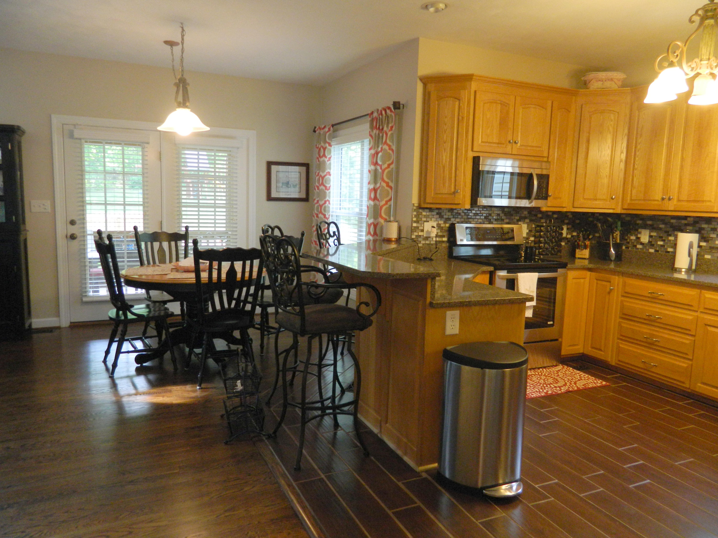 75 Cobblestone Drive Blue Ridge, VA 24064 - Photo 16 of 60 a view of a dining room with furniture window and wooden floor