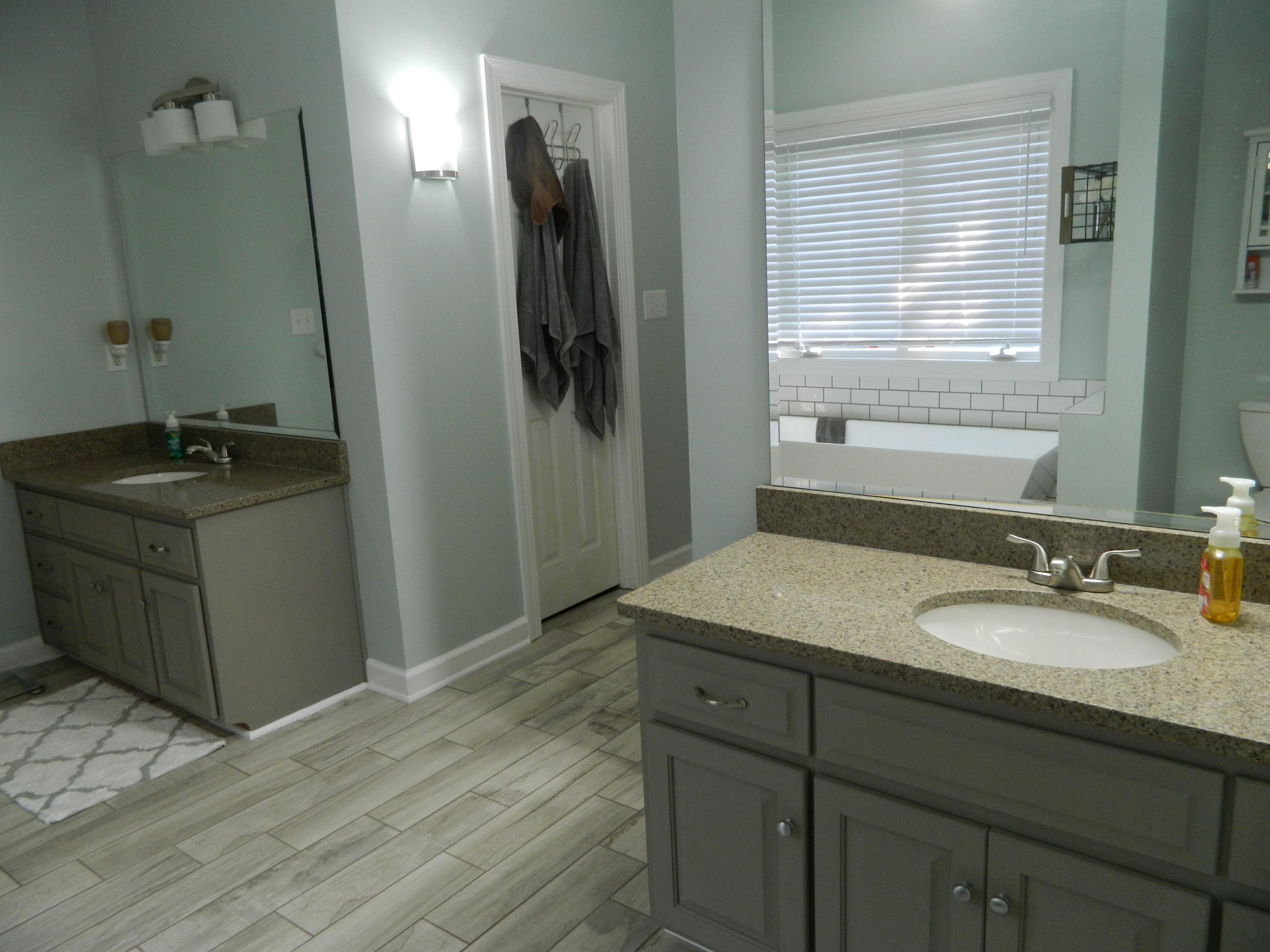 75 Cobblestone Drive Blue Ridge, VA 24064 - Photo 22 of 60 a en suite bathroom with a granite countertop sink a mirror and shower