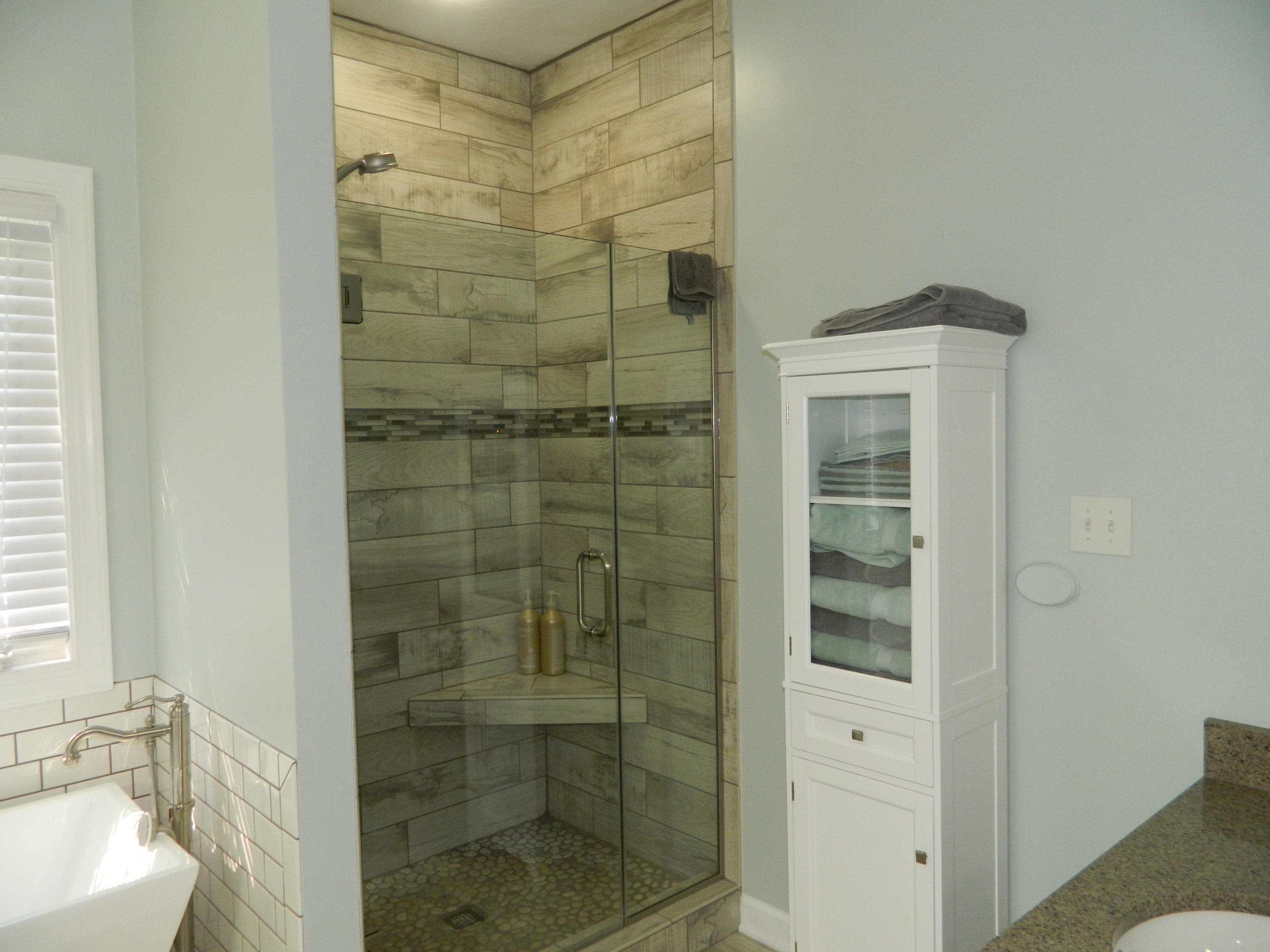 75 Cobblestone Drive Blue Ridge, VA 24064 - Photo 24 of 60 a bathroom with a shower and a sink