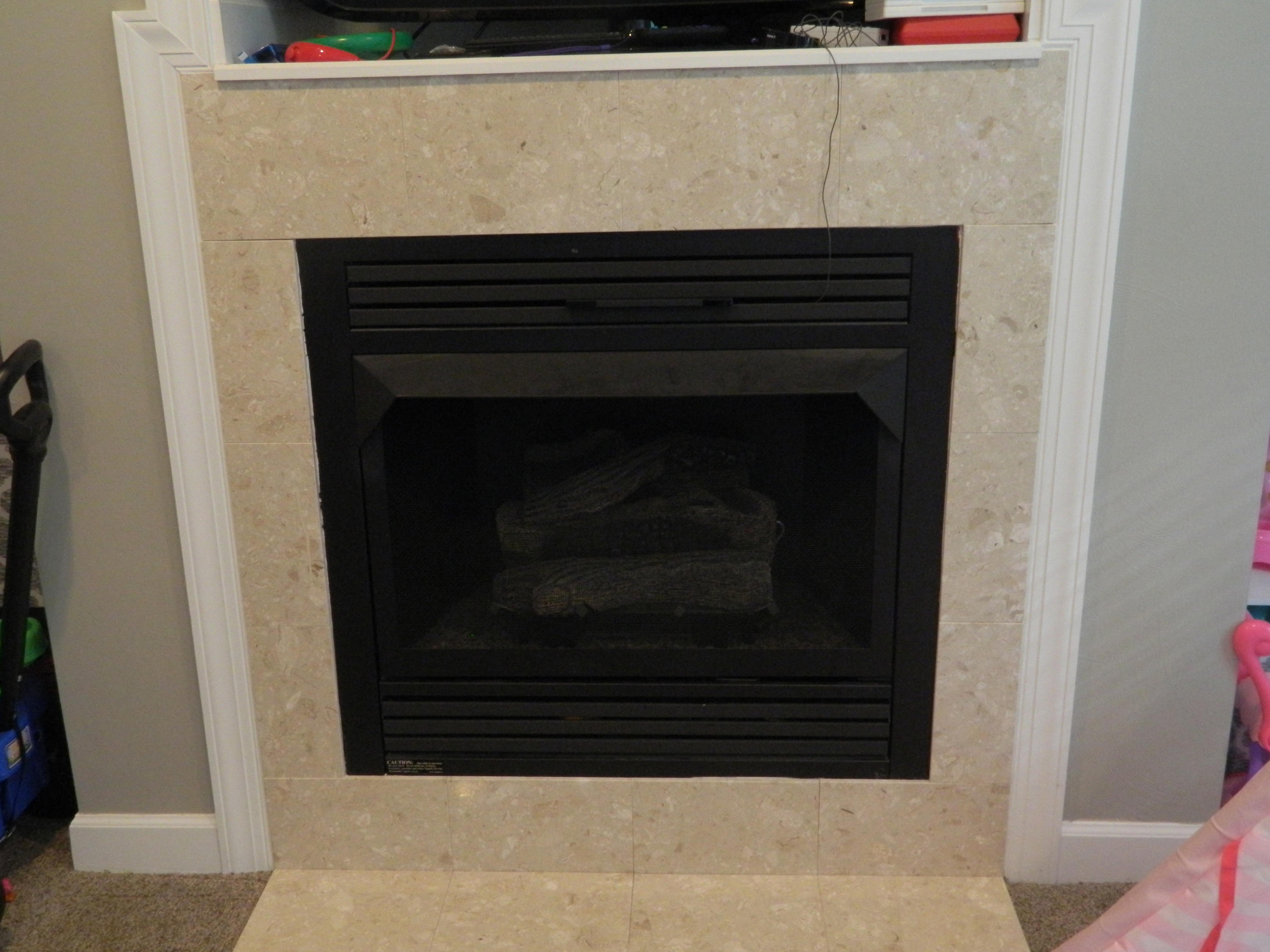 75 Cobblestone Drive Blue Ridge, VA 24064 - Photo 38 of 60 a close view of a fireplace in the kitchen